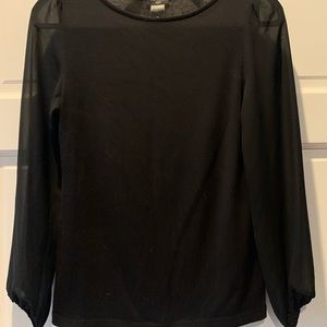 Black top with sheet sleeves